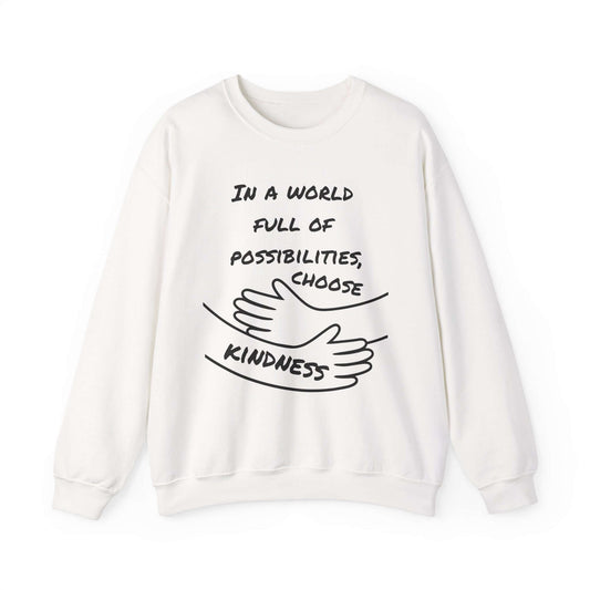 white sweatshirt featuring hugging arms and the uplifting quote “In a world full of possibilities, choose kindness” in bold black lettering. This cozy kindness-themed crewneck is perfect for spreading emotional wellness, positivity, and gentle strength — ideal for therapists, teachers, and advocates of mental health awareness or soft message apparel.