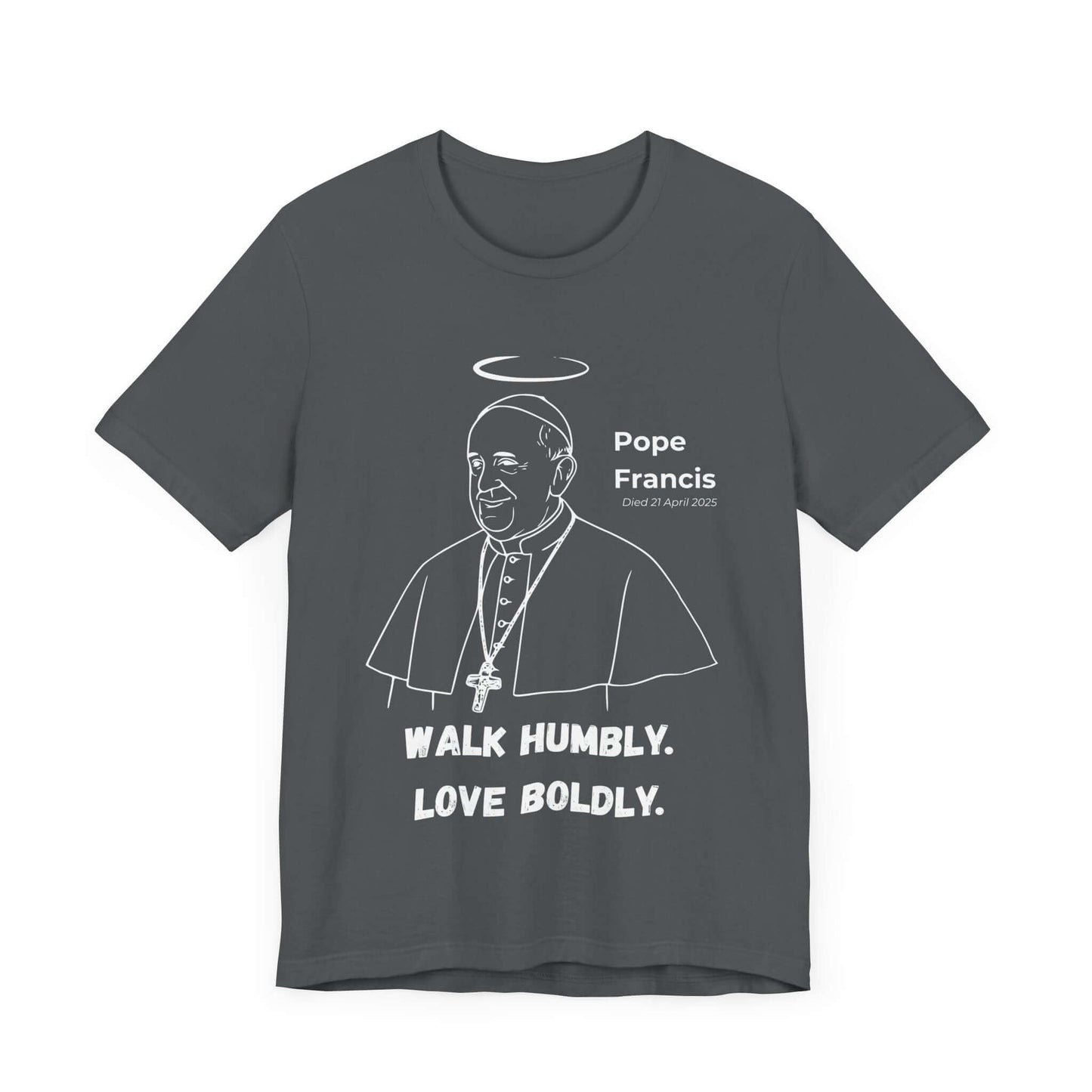 Light grey shirt with clean outline illustration of Pope Francis, a halo above his head, and the message “Walk Humbly. Love Boldly.” Printed in bold font. A peaceful tribute to a beloved religious leader.