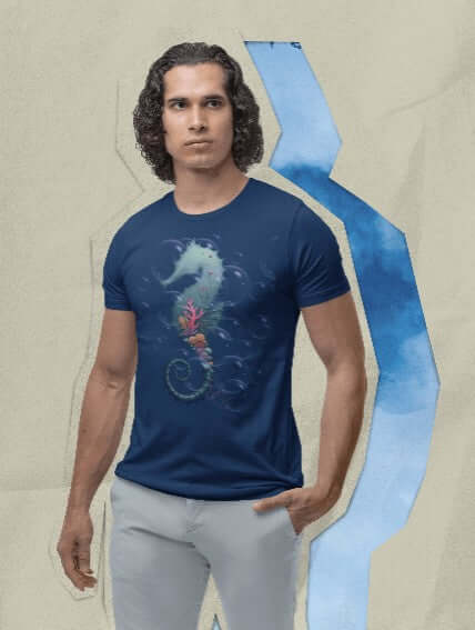 Man wearing a navy t-shirt featuring a detailed silhouette of a seahorse filled with an underwater coral reef scene, including vibrant coral, tropical fish, and sunlight filtering from above. A bold, artsy t-shirt perfect for ocean lovers, scuba divers, and quirky fashion fans.